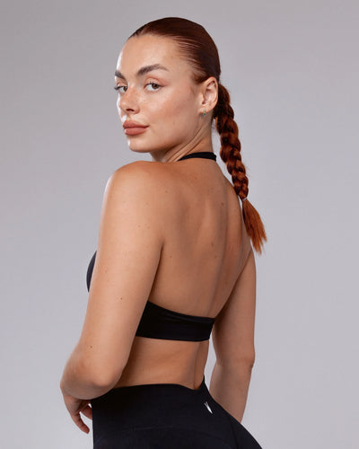טופ מחטב AURA BLACK בצבע שחור – מראה קלאסי ונקי, בד נמתח SEAMLESS, Inner Dragon