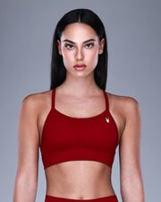 טופ ספורט NOVA WINE בצבע אדום יין – גב מוצלב X-Back, בד SEAMLESS מחטב, Inner Dragon