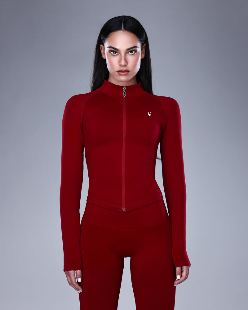 ג׳קט SEAMLESS בצבע אדום יין עמוק מבית אינר דרגון עם רוכסן מתכתי ולוגו Inner Dragon מבט קדמי